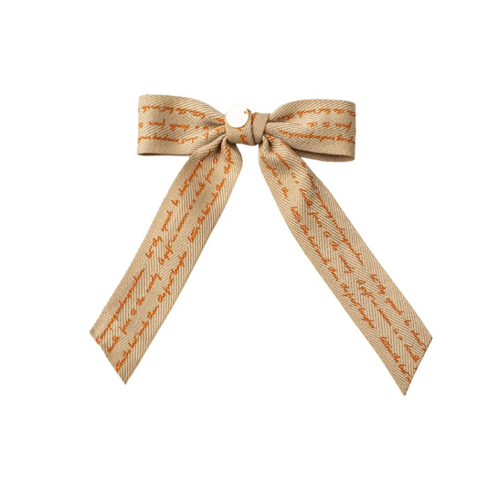 Cherie Newspaper Medium Beige Bow $5.50